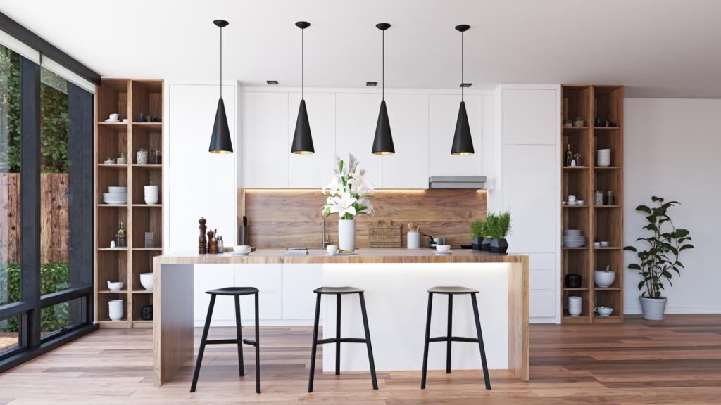 A modern kitchen with updated light fixtures and contemporary hardware on cabinets.