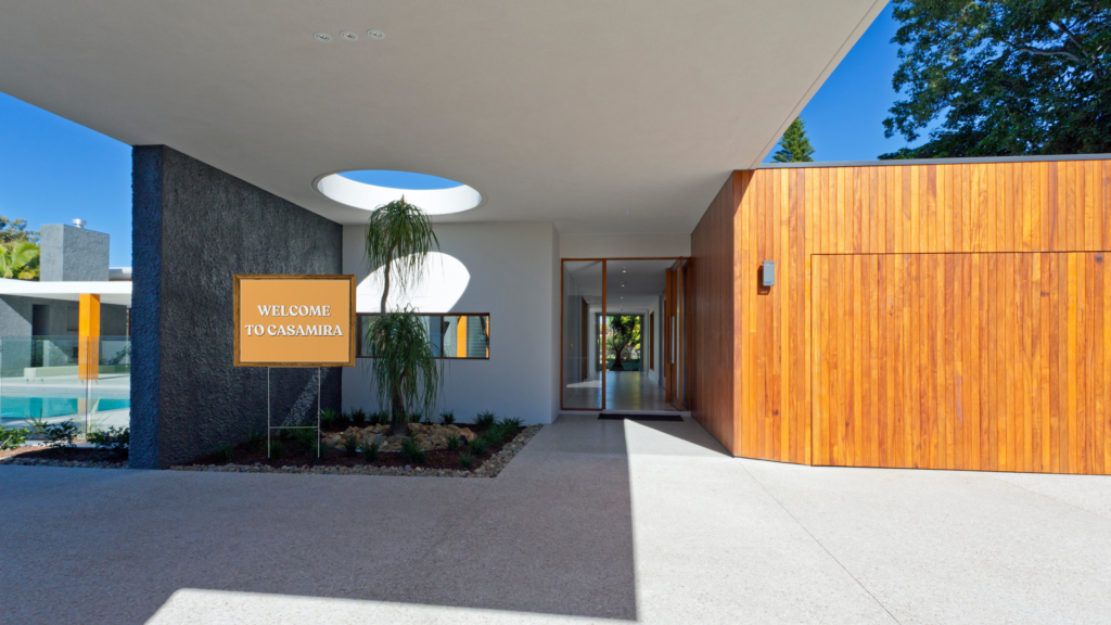 A beautifully decorated entrance with a welcome sign for shoot guests.