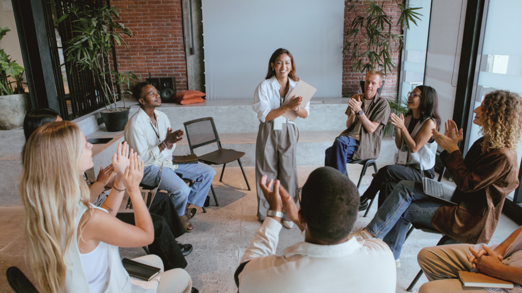 Hosts networking with photographers and other shoot location owners at an event