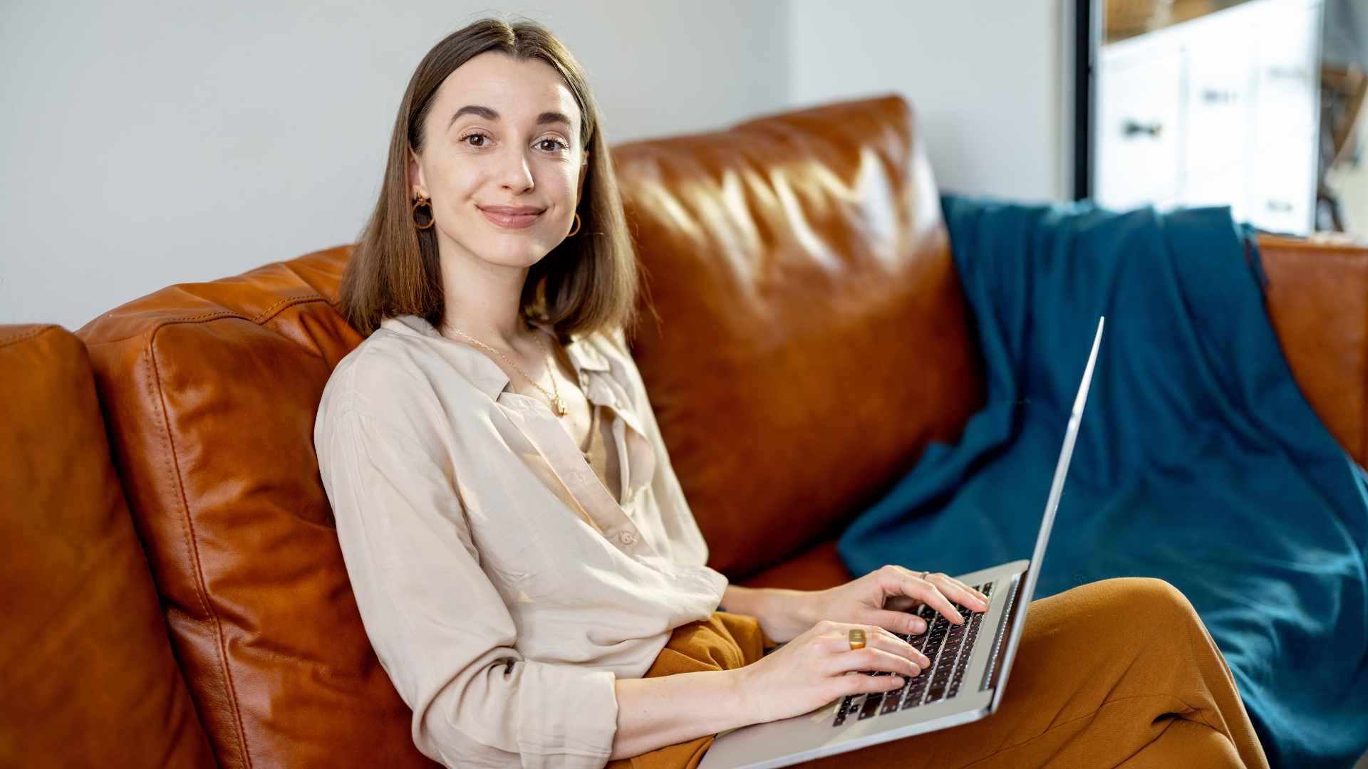 A person using software to automate administrative tasks and control costs.