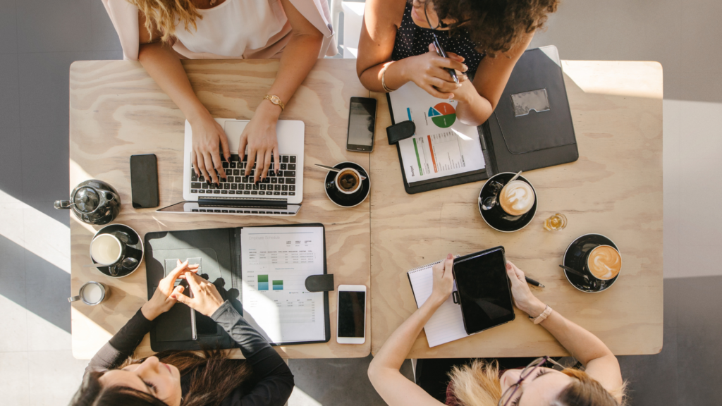 A marketing team planning social media content and paid advertising campaigns.