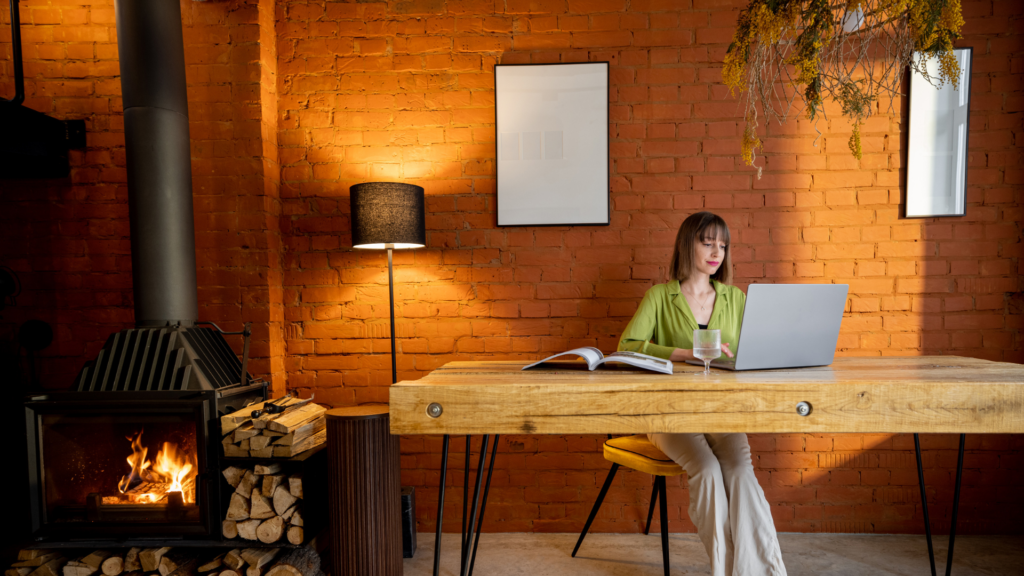 A a woman editing a photo with adjustments being made to a location photo.