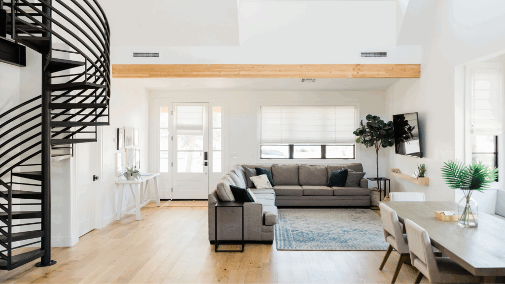 A neutral living room with simple decor and no personal items.